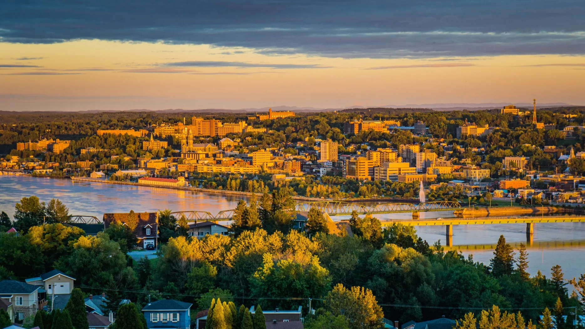 Colorful sunset and cloudy sky over the city of Chicoutimi in Quebec
